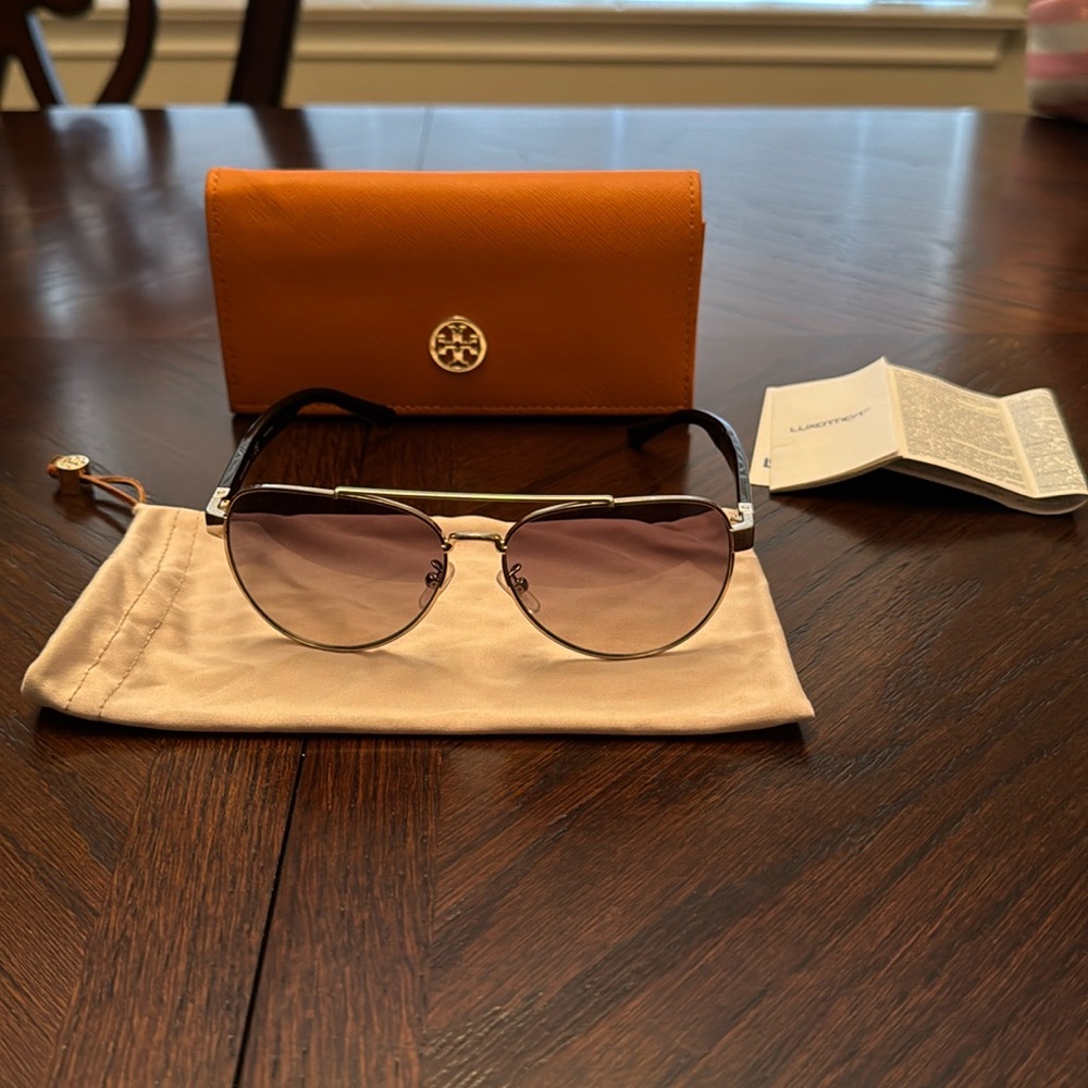 Tory Burch aviators. Womens worn twice. Maybe?  Like new